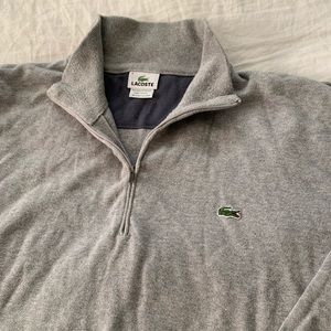 Men’s grey Lacoste sweater.